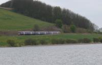 Inverness 170 passing Lindores Loch near Newburgh approaching Glenburnie Jn. No sun today.<br><br>[Brian Forbes 20/04/2007]