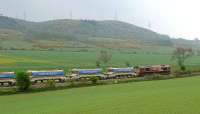 Ballast headed by 66180 inches its way west at Easter Clunie, between Newburgh & Abernethy. <br><br>[Brian Forbes 21/04/2007]