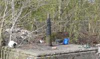 <i>Cricket anyone?</i> Helmet, box and gloves beside wicket, rubbish swept aside as we beat the WI just. Crane plinth - Newburgh 21 4 07.<br><br>[Brian Forbes /04/2007]