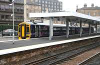 A Cowdenbeath train waits in bay platform 0 at Haymarket on 13 April 2012.<br><br>[John Furnevel 13/04/2007]