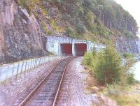 The avalanche tunnel near Attadale on the line to Kyle of Lochalsh. Looking west from a train in August 1982.<br><br>[John Gray /08/1982]