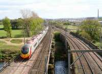 Glasgow-Euston Pendolino service crossing the River Eden at Etterby on the original bridge built to carry the WCML.<br><br>[John Furnevel 18/04/2007]