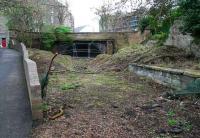 Looking south towards Rodney Street tunnel on 25 April 2007, with clearance work underway courtesy Sustrans. The path on the left leads up to Broughton Road while on the right are remains of Heriothill goods. [See image 45235] <br><br>[John Furnevel 25/04/2007]