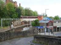 Looking west over Port Glasgow station on 29 April 2007 from the short-cut to Springhill Road. The main station entrance is located on Princes Street, lower right and gives access to a ramp leading up to platform level. [See image 14815]<br><br>[John Furnevel 29/04/2007]