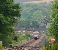 Arboreal Paradise. 170 437 on a local Dundee to Edinburgh approaching the houses of Kingskettle.<br><br>[Brian Forbes 11/05/2007]