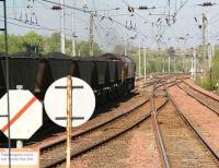 Coal train for Longannet power station comes off the Largs branch on 3 May and is about to join the Ayr - Glasgow line just north of Kilwinning station. <br><br>[John Furnevel 03/05/2007]