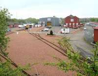 View east over Shettleston PW depot on 13 May from the bridge carrying South Hallhill Road. The link from the main line comes in on the left with Shettleston station behind the camera. The logo is that of STRC - the Scotland Track Renewals Co. (Part of the Jarvis <I>rebranding</I>).<br><br>[John Furnevel 13/05/2007]