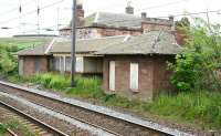 The down platform buildings at East Linton on 16 May 2007 standing alongside the ECML. Beyond is the fine looking 1846 main station building.<br><br>[John Furnevel 16/05/2007]