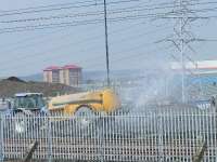 Construction work continuing at the WH Malcolm Elderslie depot, here a water tanker is at work keeping the dust down<br><br>[Graham Morgan 04/05/2007]