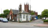 Interesting old buildings at the entrance to the former goods depot and yard at Dunbar on 16 May 2007, with Dunbar Parish Church as a backdrop. (The <I>Shoestring Cafe</I> on the left was worth the trip on its own). Dunbar station is off picture to the right.<br><br>[John Furnevel 16/05/2007]