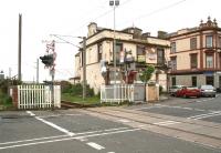 Looking over Princes Street level crossing on 17 May 2007 in the general direction of Ardrossan Harbour. Ardrossan Town station stands behind the camera.<br><br>[John Furnevel 17/05/2007]