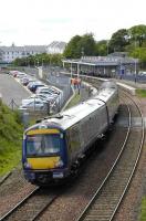 Edinburgh bound service enters Dunfermline Town on 23 May. The recently completed second car park stands on the left.<br><br>[Bill Roberton 23/05/2007]
