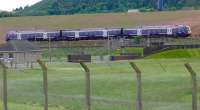 Aberdeen service passing RAF Leuchars fuel depot at nearby Linkswood. Reception siding seen below coaches.<br><br>[Brian Forbes 24/05/2007]