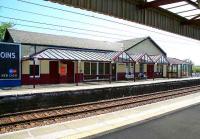 Looking across the line to the southbound platform at Irvine with the glass canopy continued from the main entrance and covered stairway.<br><br>[John Furnevel 03/05/2007]