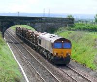 66030 heads north with 6A30 Mossend - Aberdeen pipes approaching Plean signal box.<br><br>[Brian Forbes 25/05/2007]