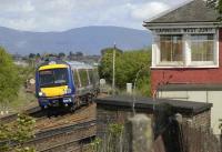 The 1155 Stirling - Glasgow Queen Street service passing Carmuirs West Junction on 25 May 2007.<br><br>[Bill Roberton 25/05/2007]