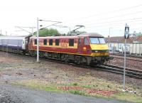 90026 with the empty stock of the Edinburgh portion of the Caledonian Sleeper crossing the up WCML and entering Carstairs on 17 May en route to Polmadie.<br><br>[John Furnevel 17/05/2007]