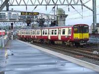 314209 departing Platform 13 on an empty coaching stock move<br><br>[Graham Morgan 10/05/2007]