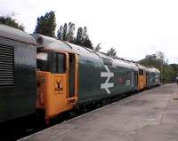 Unlucky for the <I>bashers</I> (Rail enthusiasts) on this trip to the Far North. Rained most of the time. Two 50s in disguise wait at Perth in May 2006.<br><br>[Brian Forbes /05/2006]