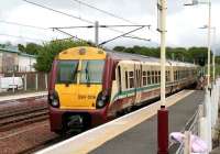 Dalmuir service leaving Lanark on 23 May.<br><br>[John Furnevel /05/2007]