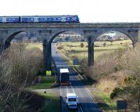 Edinburgh - Markinch service crosses the viaduct just south of its destination in February 2007.<br><br>[John Furnevel /02/2007]