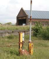 Looking north over the abandoned sidings towards the rear of the old locomotive shed at Stranraer in May 2007. Stranraer shed (68C) had been officially closed in October 1966.<br><br>[John Furnevel 31/05/2007]