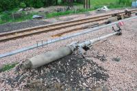 How are the mighty fallen. Felled signalpost at Manor Powis. From Stirling? Note neat and capped cable tray by the line. Colour lights will rule the line now.<br><br>[Ewan Crawford 02/06/2007]