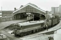 Freight drawn by A-Class 042 leaving Kent station, Cork in October 1988. <br><br>[Bill Roberton /10/1988]