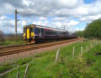 The first Oban/Mallaig southbound service of the day joins the North Clyde electric lines just east of Craigendoran Junction. May 2007.<br><br>[John McIntyre 28/05/2007]