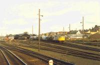 26 shunting the sidings south of Montrose, viewed from mainline. The goods shed has now gone.<br><br>[Ewan Crawford 03/11/1989]