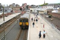 Largs in May 2007, showing the infilled bay platforms on the right. Much of the pedestrian traffic uses the route through the station to access the local Superstore, built on the site of the former goods yard (behind camera). <br><br>[John Furnevel 17/05/2007]