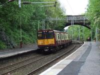 314215 departing Cartsdyke heading west, next stop Greenock Central<br><br>[Graham Morgan 23/05/2007]