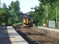 156504 approaching Pollokshaws West with an express service for Glasgow Central<br><br>[Graham Morgan 28/05/2007]