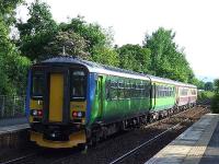 On loan Central Trains 156403 passing through Pollokshaws West at the rear of a two unit set with an express service for Glasgow Central<br><br>[Graham Morgan 28/05/2007]