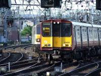 Behind you!!!  92026 Britten sneaking up on 314201 on the approach to Glasgow Central.<br><br>[Graham Morgan 28/05/2007]