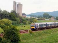 Edinburgh bound 170.150 passes a silo approaching Cupar.<br><br>[Brian Forbes 10/06/2007]