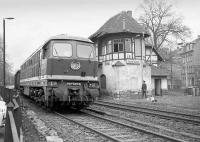 A Russian diesel passes Jena, East Germany on a freight in 1987, some 2 years before the wall came down and 3 years before the official end of the DDR. <br><br>[Bill Roberton //1987]