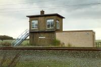 Obscure signalboxes: Heatheryknowe. This was located west of Blairhill at the former Heatheryknowe Junction where lines to Lochwood and Heatheryknowe collieries left the Glasgow to Airdrie line. The box was abolished by the Yoker resignalling scheme. View looks north.<br><br>[Ewan Crawford /12/1989]
