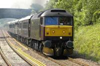 Royal Scotsman heads north through Dalgety Bay on 18 June en route to Keith behind 47854.  <br><br>[Bill Roberton 18/06/2007]