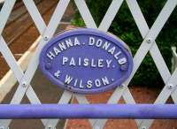 Plate on a bridge, West Calder. Founded 1816 as Reid & Hanna, engineers, Paisley. Contracts included major work on Waverley and St Enoch stations. Wound up 1910s. [See image 29155]<br><br>[John Furnevel 21/06/2007]