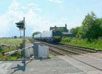 Taken into direct sunlight the late running 1540 Glasgow to Aberdeen passes Forteviot LC.<br><br>[Brian Forbes 21/06/2007]