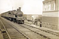 An up fish express from Fraserburgh passing Lonmay in 1945. G.N.S.R. 4.4.0 6826.<br><br>[G H Robin collection by courtesy of the Mitchell Library, Glasgow //1945]