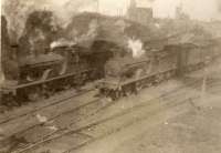 Aberdeen train leaving Fraserburgh. G.N.S.R. 4.4.0 6831 (in background). G.N.S.R. 4.4.0 6826 shunting.<br><br>[G H Robin collection by courtesy of the Mitchell Library, Glasgow //1945]