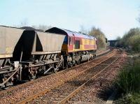 An eastbound coal train approaches the route indicator signal for Langloan Junction on 4 April shortly after passing through Kirkwood heading for Longannet power station.<br><br>[John Furnevel 04/04/2007]