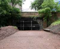 Clearance work on Rodney Street tunnel seen from the site of Heriothill Goods on 25 June 2007. View south under Broughton Road/Rodney Street towards Scotland Street (now visible through the north portal) and the next tunnel, which eventually emerged at Canal Street terminus.<br><br>[John Furnevel 25/06/2007]