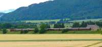 Like a model train, the Royal Scotsman travels north west past Abernethy.<br><br>[Brian Forbes 25/06/2007]