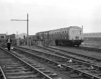 A 2 car  Metro-Cammell DMU sits amongst the remains of the goods yard at Fraserburgh on 01 June 1974 with the Buchan Belle railtour.<br><br>[John McIntyre 01/06/1974]