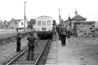 Scene at Maud on 1 June 1974 with the <I>Buchan Belle</I> at the platform. Note the clothes and hairstyles of the day! [Editors note: A serious complaint has been received concerning this caption from a Mr Roberton asking <I>'Whats wrong with the clothes and  hairstyles?...  by the way, that's me in the 4 foot!!!'</I>] [See image 15675]<br><br>[John McIntyre 01/06/1974]