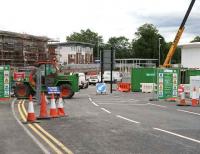 Access for traffic to Alloa Station from the new roundabout on 29 June. Some road marking and signposting has been carried out while work on the station building is ongoing in the background.  <br><br>[John Furnevel /06/2007]