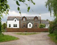 Former station building at New Galloway (located in Mossdale), now with extensions on both sides. View south from the site of the station yard in May 2007. <br><br>[John Furnevel 11/05/2007]